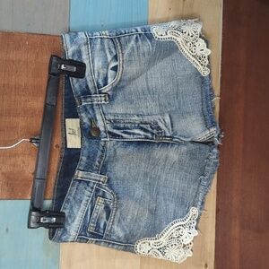 Size 26 lost jean shorts with lace edging